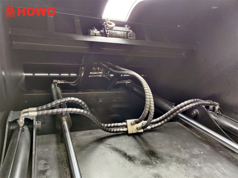 HOWO rear loader truck tilting device